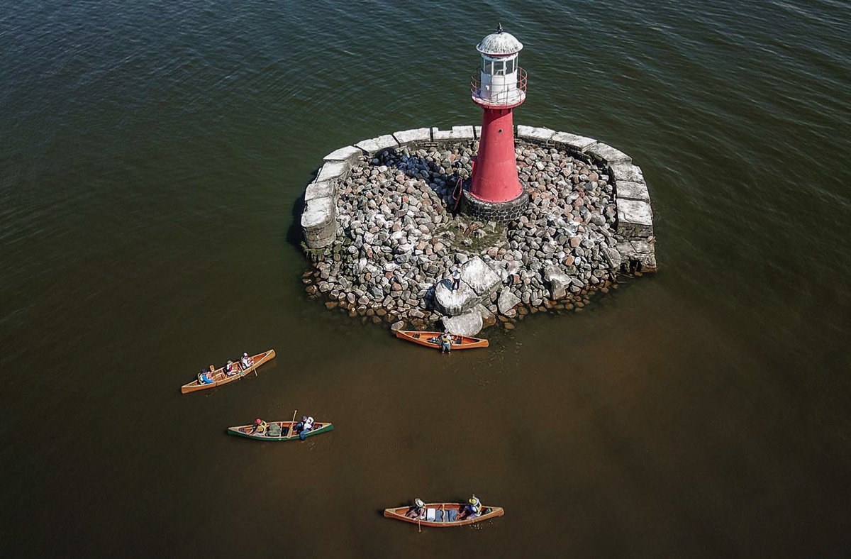 Canoes at the Pervalka lighthouse 
