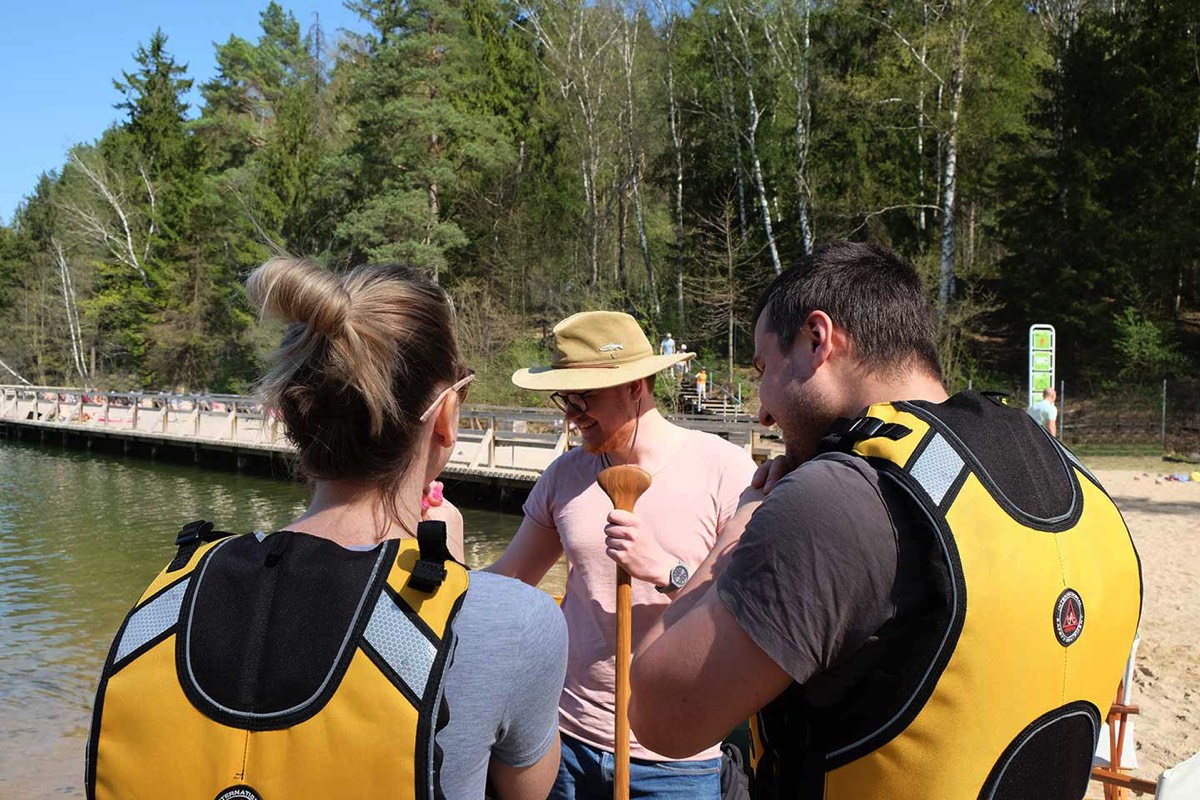 Canoe paddlers are instructed before a tour in Plateliai, Lithuania