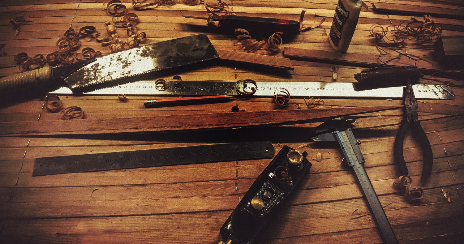 Cedar canoe whiskey plank and tools